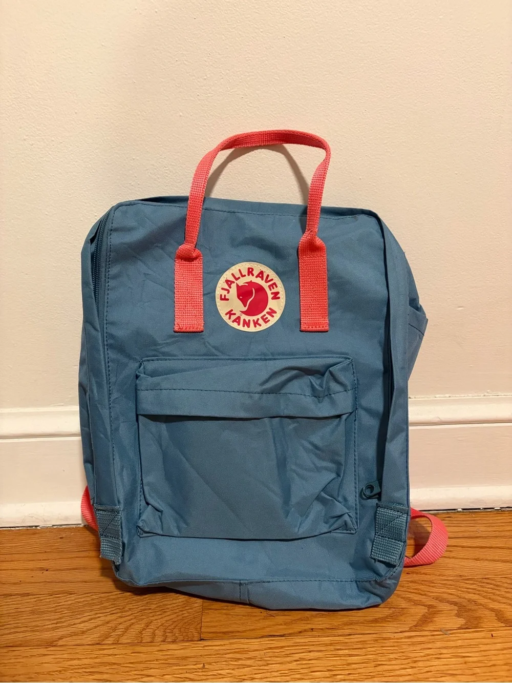 Fjallraven Kånken Blue Backpack with Coral Handles